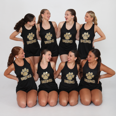 A large group of women wearing black with Logowear